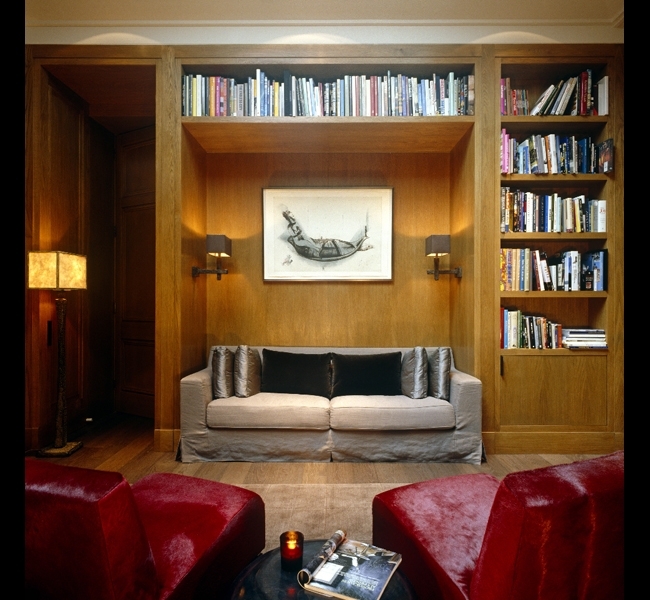 Alcove wall lights in bronze by Hannah Woodhouse, with silk lampshades. 