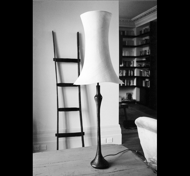 This gorgeous and elegant bronze Proud Woman table lamp is topped with a sumptuous and sculptural lampshade in bias cut linen by artist Hannah Woodhouse 