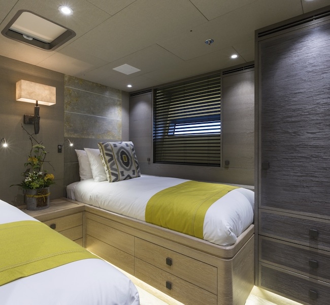 Guest Cabin super yacht Inukshuk, hand painted bed heads & wall sconces by Hannah Woodhouse