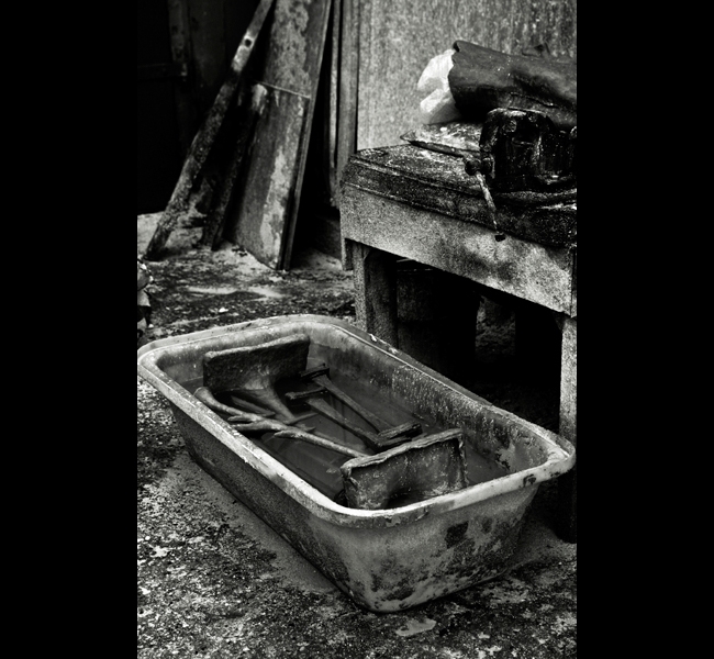 Waxes being kept cool in bath of water before casting in bronze